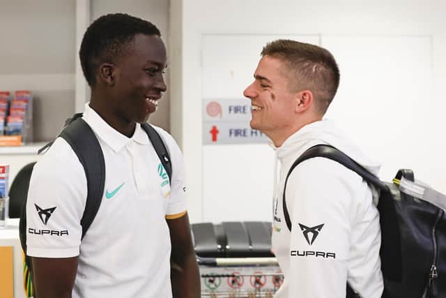 Garang Kuol and Hearts midfielder Cammy Devlin arrive at Sydney Airport last month. They both made their Socceroos debuts against New Zealand in September. Picture: Mark Evans/Getty