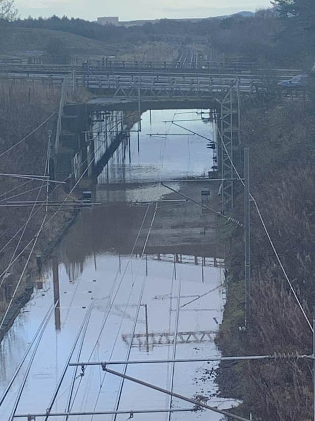 Flooding on the the rail line near Edinburgh Park has affected Edinburgh-Glasgow trains.