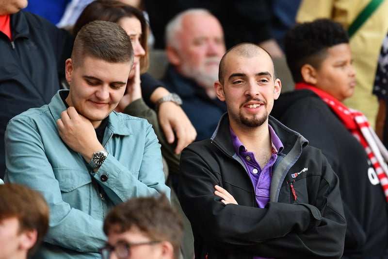 A pair of Black Cats supporters enjoy the match during their visit to the Stadium of Light last Saturday.