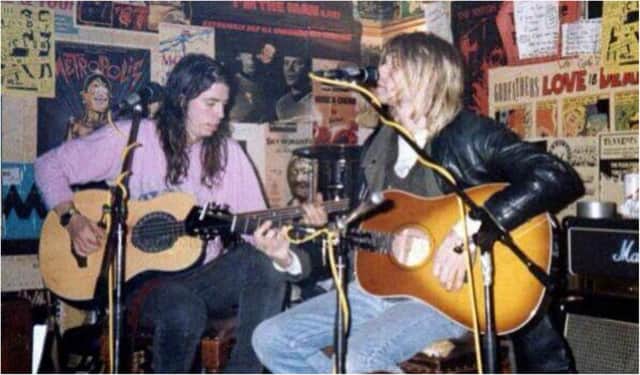 Left, Dave Grohl, and right, Kurt Cobain as the Nirvana pair perform an acoustic set at the Southern Bar in Edinburgh.