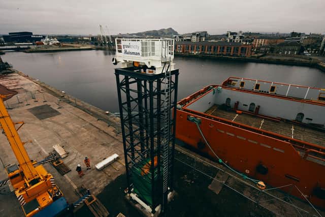 A 15m-high lattice-work tower has been erected at Leith docks as part of a pioneering green energy storage project, which will be able to provide emergency power in a matter of seconds