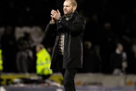 Hearts manager Robbie Neilson applauds fans at full time following the 1-1 draw at St Mirren.