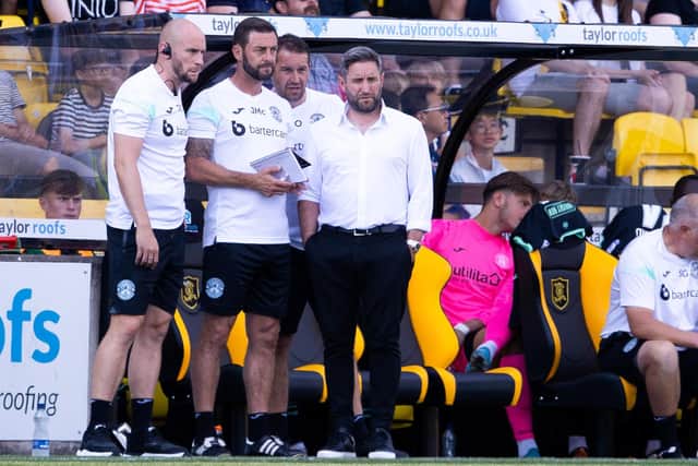 Manager Lee Johnson with the rest of the Hibs backroom staff during the 2-1 loss to Livingston in West Lothian. Picture: SNS