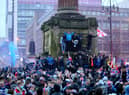 Police said arrests were made and fines were issued after people broke lockdown rules in George Square (PA Media)