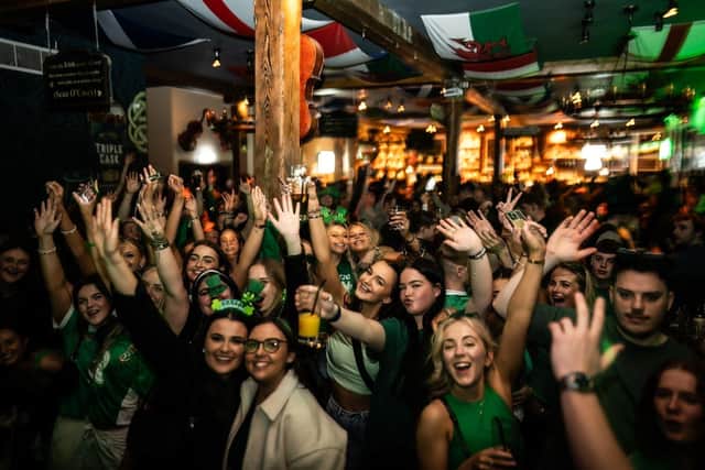 Crowds soak up the St Patrick's Day atmosphere at Malones in Edinburgh