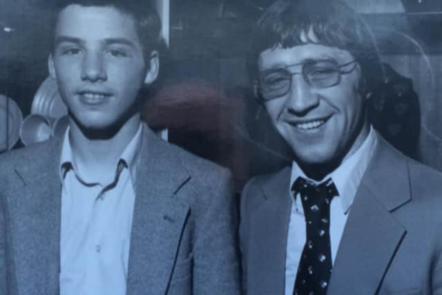 Ken Buchanan celebrating with a young Owen Smith after he was awarded fighter of the night at the Tartan Club in the early 1980s