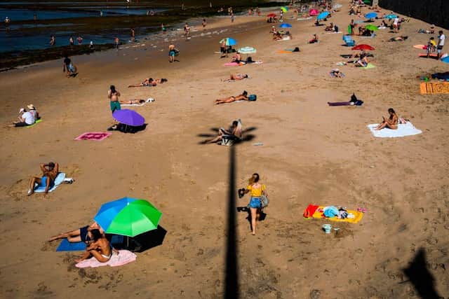 This is how beaches in Portugal currently look, as people respect social distancing measures (Photo: PATRICIA DE MELO MOREIRA/AFP via Getty Images)