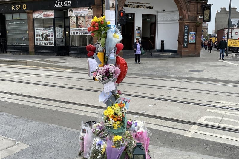 So many people have left flowers and cards on Constitution Street in Edinburgh.