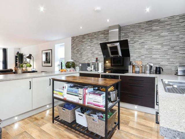 Another view of the kitchen, which has all you need for a comfortable lifestyle. As you can see, there is plenty of storage space too.