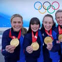 Golden girls: Great Britain's Mili Smith, Hailey Duff, Jenn Dodds, Vicky Wright and Eve Muirhead celebrate with the gold medal