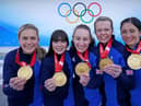 Golden girls: Great Britain's Mili Smith, Hailey Duff, Jenn Dodds, Vicky Wright and Eve Muirhead celebrate with the gold medal