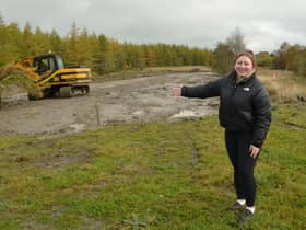 Chanelle Maver points to the new 'canal' being constructed at Drumtassie Fishery near Blackridge. Picture by Nigel Duncan