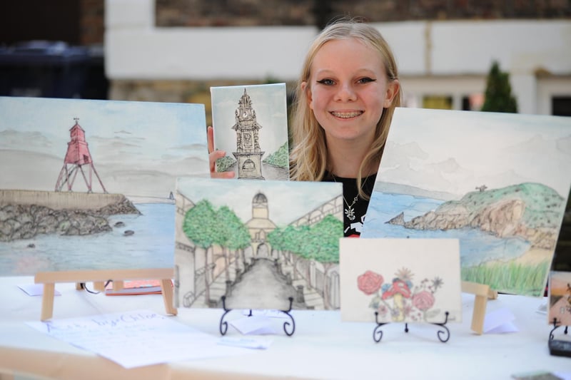 Artist Chloe Warnock selling her local scenes at Westoe Village Fete