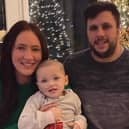 Steph Kent and Jamie Gentleman with their daughter Flora when she was three