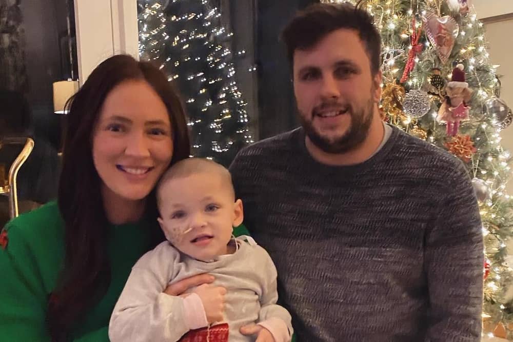 Steph Kent and Jamie Gentleman with their daughter Flora when she was three