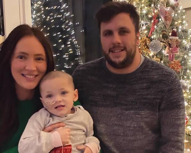 Steph Kent and Jamie Gentleman with their daughter Flora when she was three