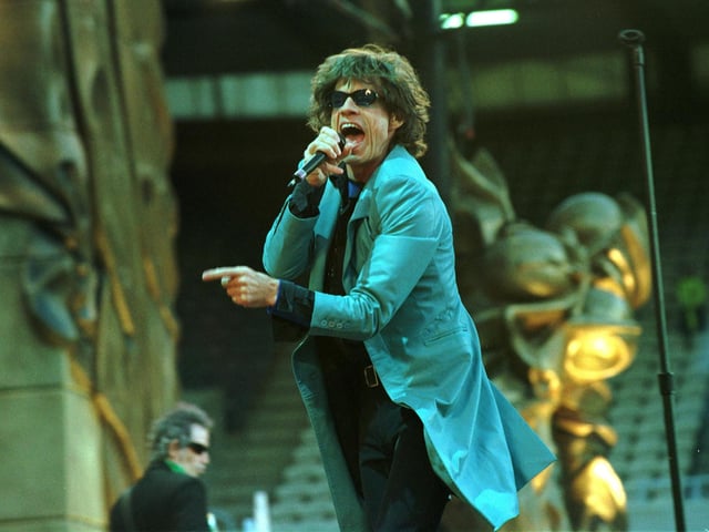 Rock legend Mick Jagger performing on stage at Murrayfield with The Rolling Stones in 1999.