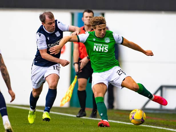 Dundee's Paul McGowan tracks Hibs full-back Sean Mackie