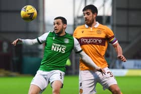 Drey Wright of Hibs holds off Motherwell's Declan Gallagher during the last meeting between the two teams