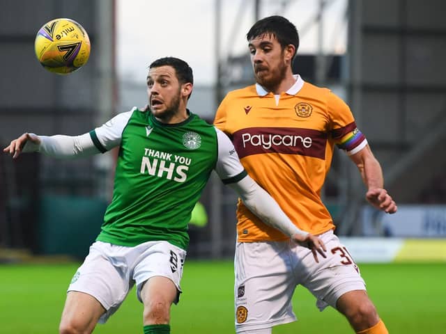 Drey Wright of Hibs holds off Motherwell's Declan Gallagher during the last meeting between the two teams