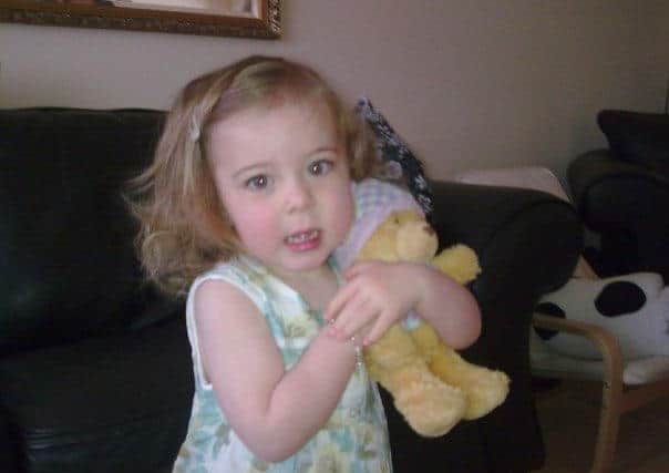 Holly with Ted when she was younger