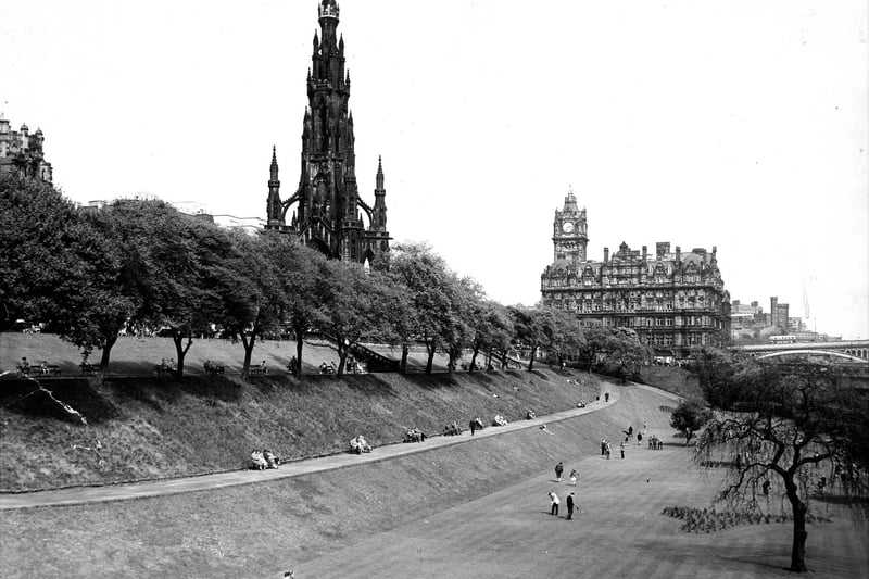 The putting green is a popular place for holidaying people in East Princes Street Gardens in 1959.