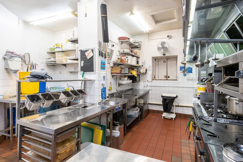 The commercial kitchen is located on the lower ground and is well set out with a preparation area and principal cooking area.