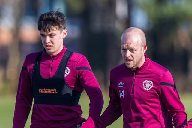 Aaron Hickey (left) and Steven Naismith during a Hearts training session at the Oriam