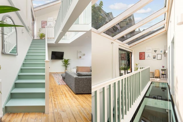 Upstairs, a brightly lit landing has garden access and a feature glass-panelled floor, peering down into the living area to allow extra light to flow throughout.