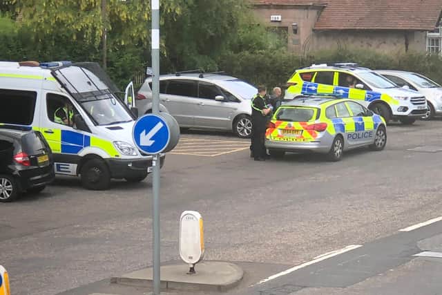 A large police presence appeared at Cluny Gardens on Tuesday morning