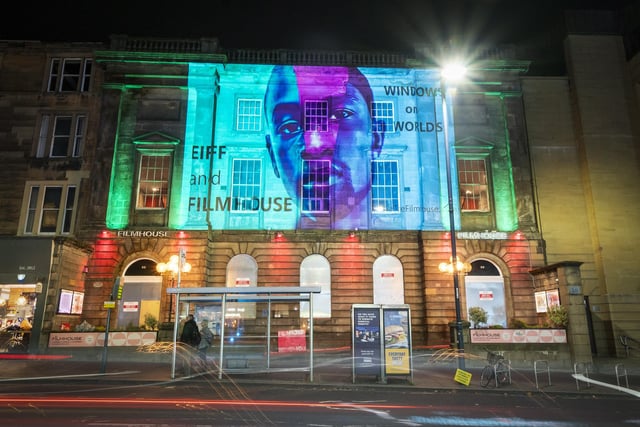 An image from the Oscar-winning film Moonlight, projected onto the Filmhouse in Edinburgh, is one of several classic movie images projected onto landmarks and public buildings in the city as part of the campaign to save the Edinburgh International Film Festival and the Filmhouse. Picture date: Monday October 31, 2022.