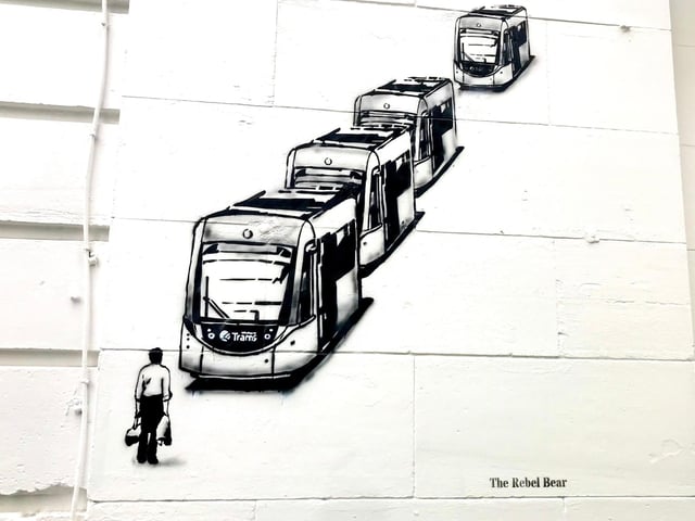 This artwork by divided opinions when it emerged on Jane Street last year. The graffiti shows a man standing in front of a line of Edinburgh trams in protest with a clear visual comparison to the Tiananmen Square protests in 1989. Though some thought the artwork represented the feelings some had over the disruption of the project, others believed comparing the project to an infamous massacre was in bad taste.