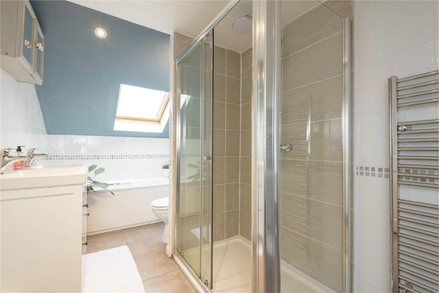 Tasteful with a great ceiling window to gaze at the stars when you're lying in the bath.