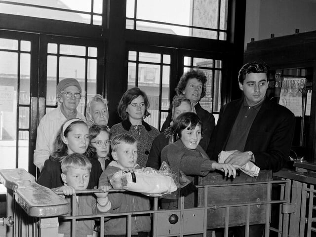 Customers waiting at the turnstile of Portobello Outdoor Swimming Pool in 1965.