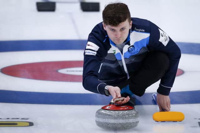 Bruce Mouat in action at the World Curling Championships in Calgary last year. Now he's bidding for double Olympic gold.