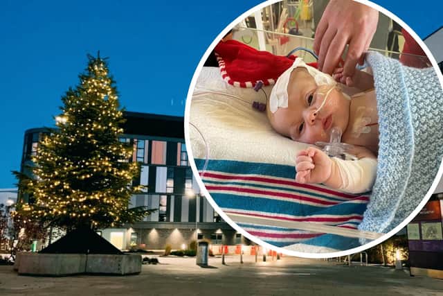 Joey was the first to switch on the lights at the new hospital