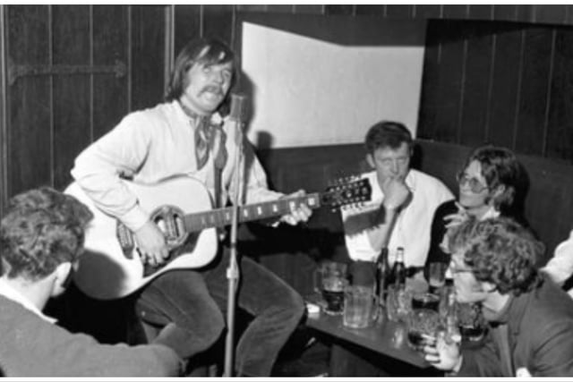 Folk singer Tam White gig at the Yellow Carvel in 1970. Known for a time as one of Edinburgh’s chief folk venues, The Yellow Carvel owed its rather curious name to a 300-ton armed merchant ship (or caravel) harboured at the port of Leith in the 15th century.Located on Hunter Square in the 1960s and ‘70s, the pub became a haven for the city’s patchouli-scented folk crowd, as well as blues and jazz types.