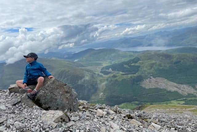 Finn Oxtoby takes in the stunning views from the top of Ben Nevis.