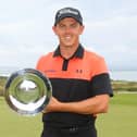 Grant Forrest poses with the trophy following his victory in last year's Hero Open at Fairmont St Andrews. Picture: Andrew Redington/Getty Images.