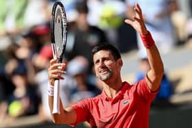 Serbia's Novak Djokovic reacts after winning against Slovenia's Aljaz Bedene.  (Photo by CHRISTOPHE ARCHAMBAULT/AFP via Getty Images)