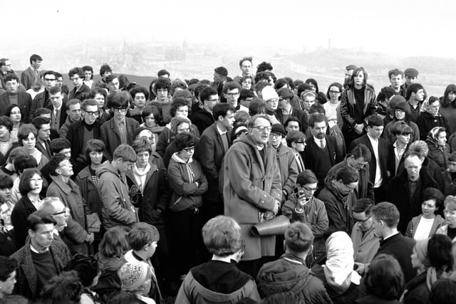 The Reverend Dr. Ronald Selby Wright, who was minister at Canongate Kirk from 1937 until 1977, conducts a May Day service on top of Arthur's Seat.