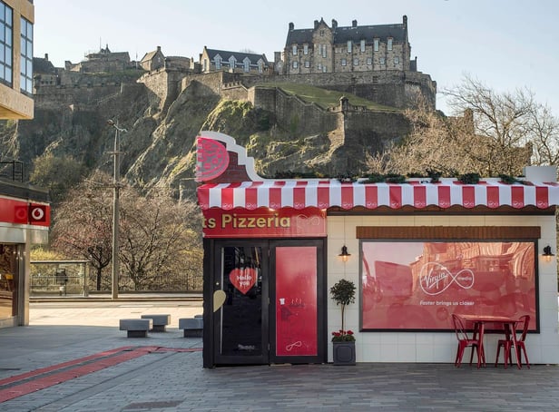 The Two Hearts Pizzeria dining experience in Edinburgh, which Virgin Media is showcasing to bring people closer together and offer guests the chance to share a pizza with a loved one 400 miles apart via hologram, as if sat at the same table.