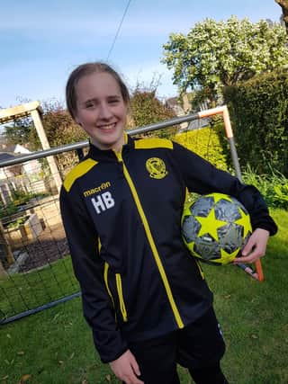 Holly Blackham, 13, took part in the Virtual Kiltwalk and was part of more than 60 volunteers who helped dribble a ball from Pittodrie Stadium to Hampden Park