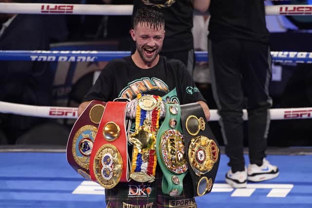 Josh Taylor celebrates with his belts after defeating Jose Ramirez. The Scot returned home but the belts didn't.
