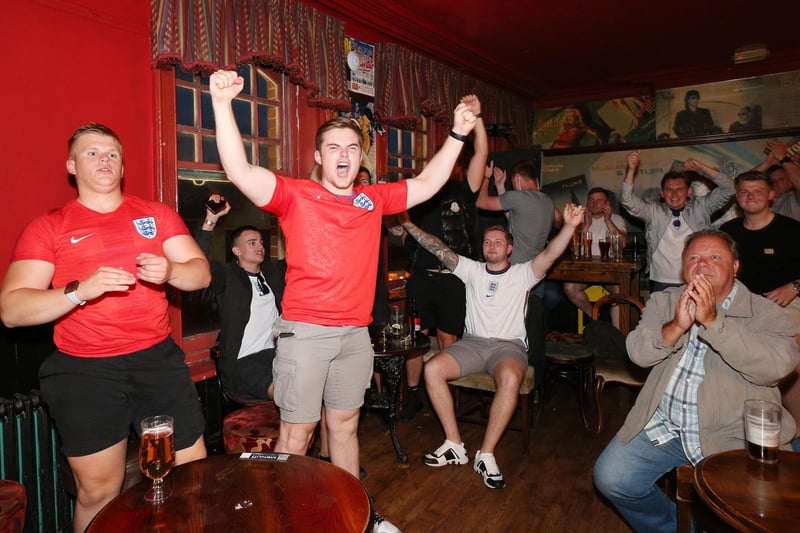 Celebrations at full-time. Fans watch England v Ukraine in the quarter finals of Euro 2020, in The Kings pub, Albert Rd, Southsea. Picture: Chris Moorhouse (jpns 030721-23)