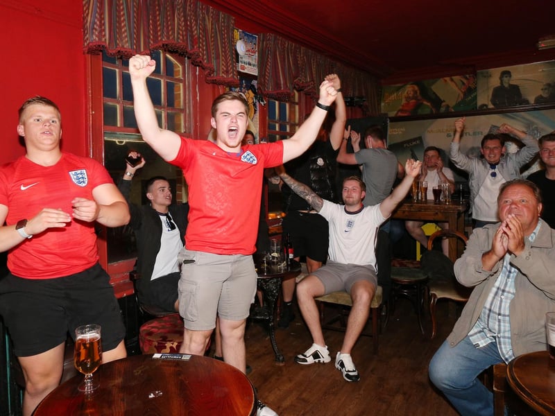 Celebrations at full-time. Fans watch England v Ukraine in the quarter finals of Euro 2020, in The Kings pub, Albert Rd, Southsea. Picture: Chris Moorhouse (jpns 030721-23)