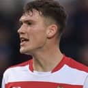 Former Doncaster defender Joe Wright has an offer from Hearts.