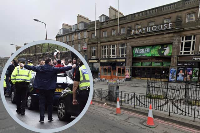 Theatre-goers were rushed into the Playhouse last night as Hearts and Hibs fans clashed at Greenside Place last night, Wednesday, December 27.