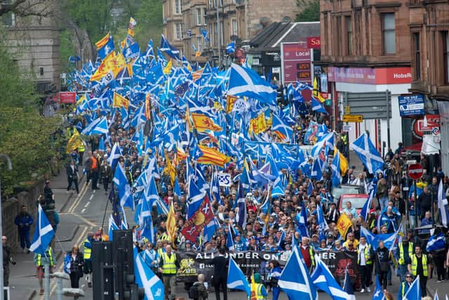 Scottish independence supporters march through Glasgow during the All Under One Banner march.