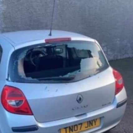 Costly: Smashed rear window